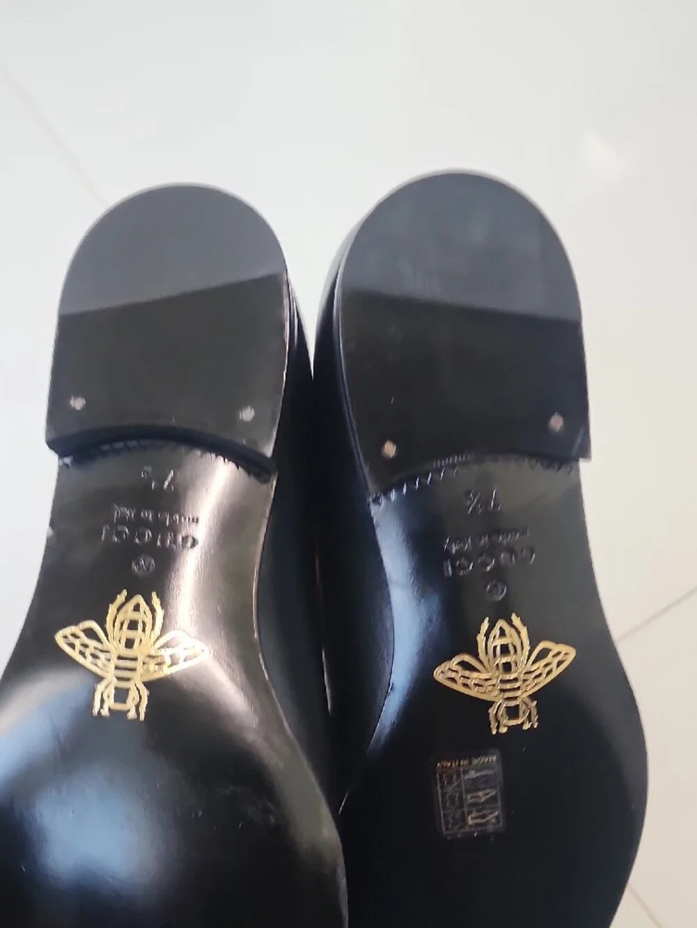 Gucci Black Leather Tassel Loafers with Gold Cat Accent